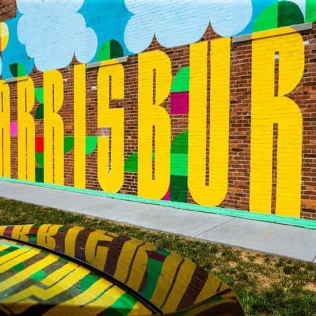 mural on brick wall says Harrisburg in large letters