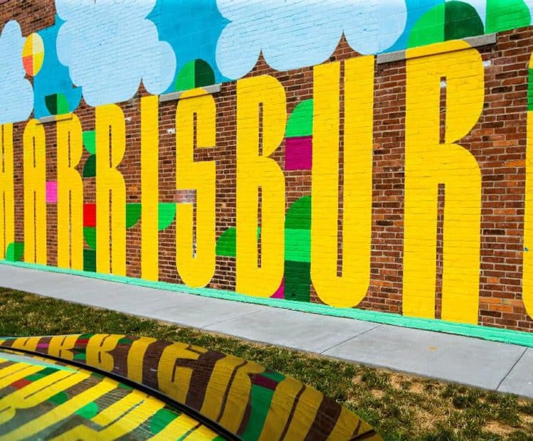 mural on brick wall says Harrisburg in large letters