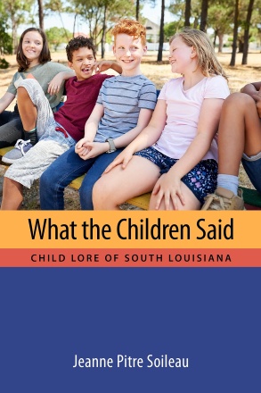 front cover of a book with several children depicted in a natural setting with the book title listed