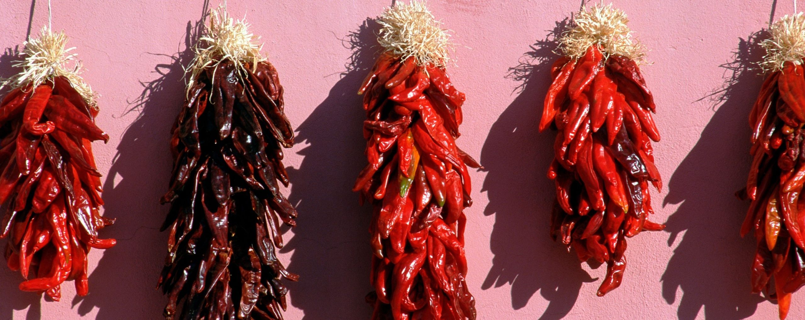 A group of ristras hanging in Albuquerque, New Mexico.